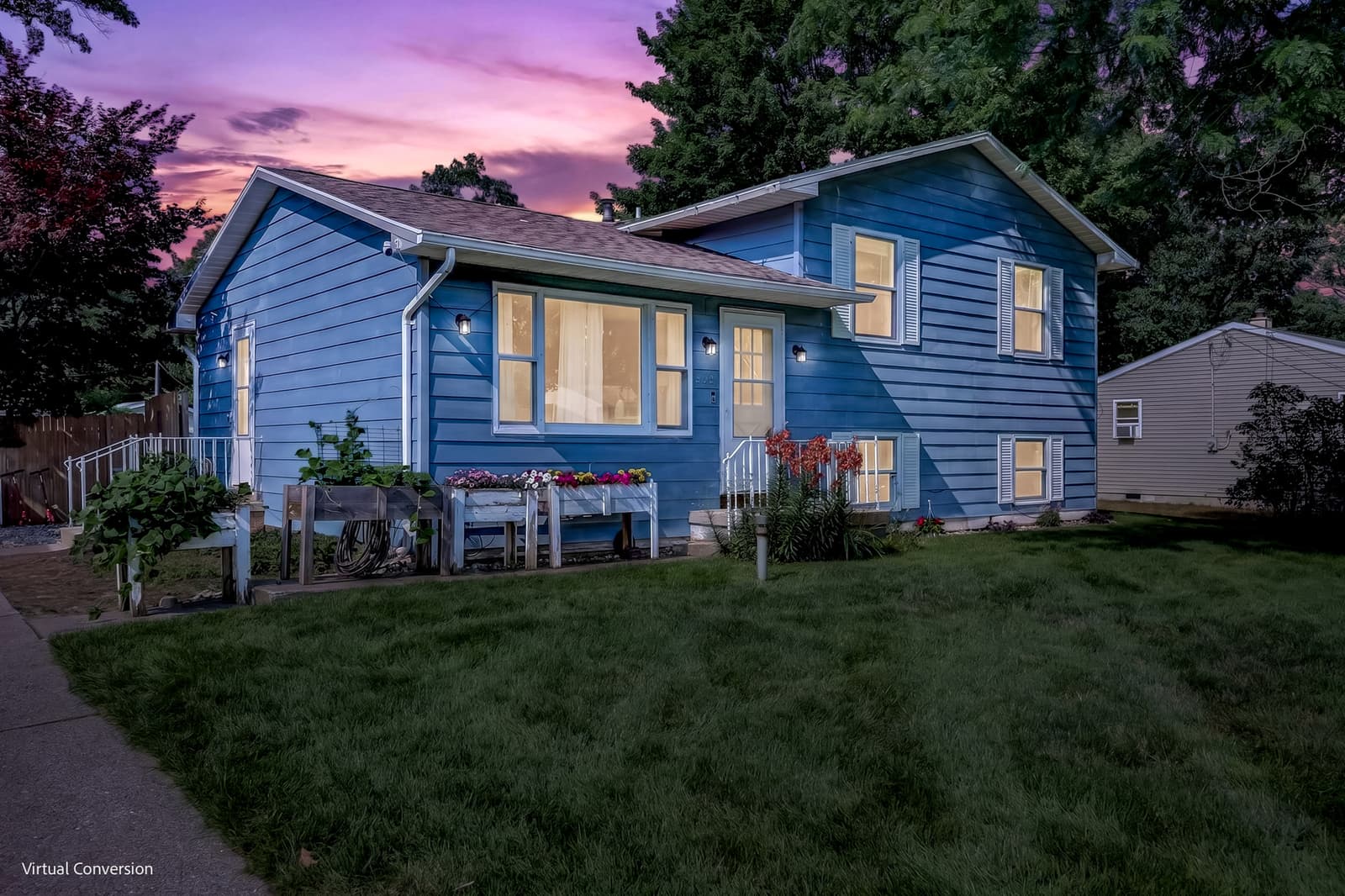 Home photographed at twilight with the interior lights on